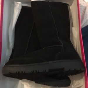 women's size 7 Rampage black boots. Never worn